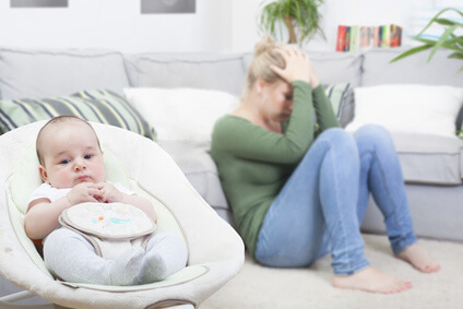 Young woman suffering from postpartum depression